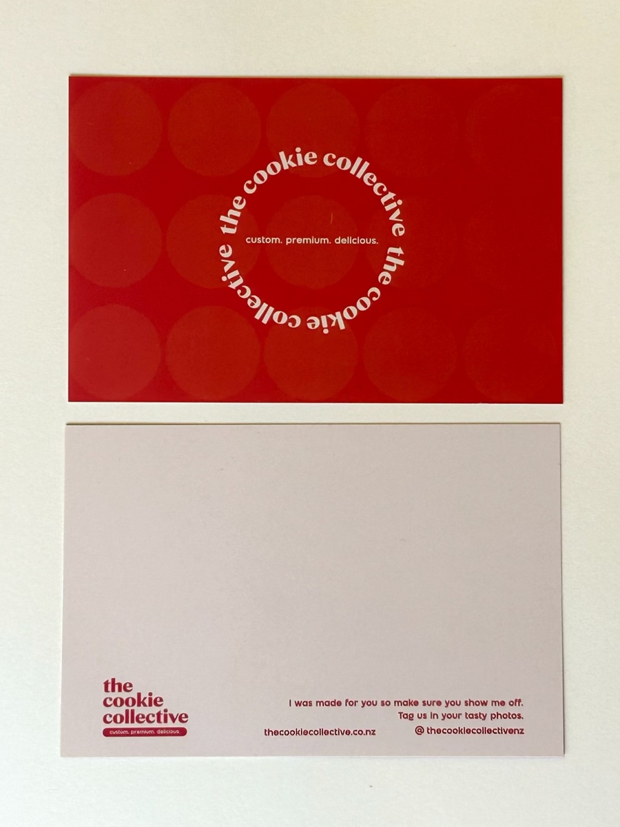 Red and white packaging with 'the cookie collective' branding on a beige background